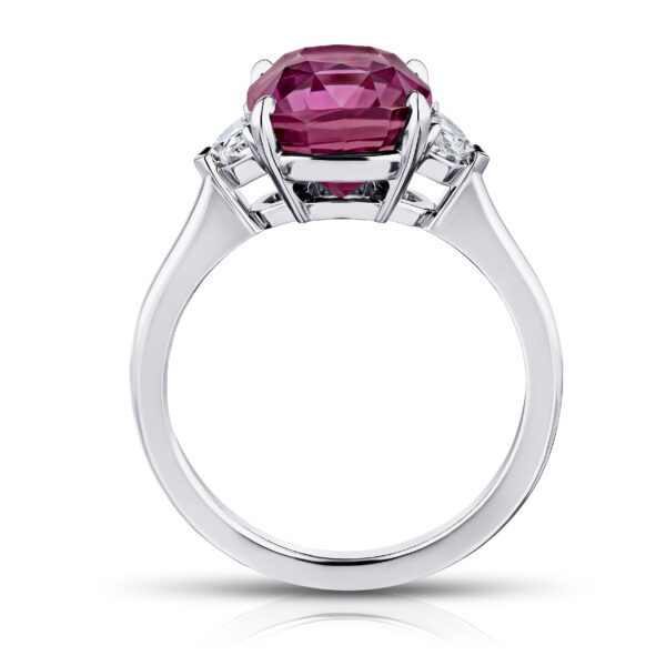 5.88 carat cushion pinkish red sapphire with epaulet cut diamonds .34 carats set in a platinum ring